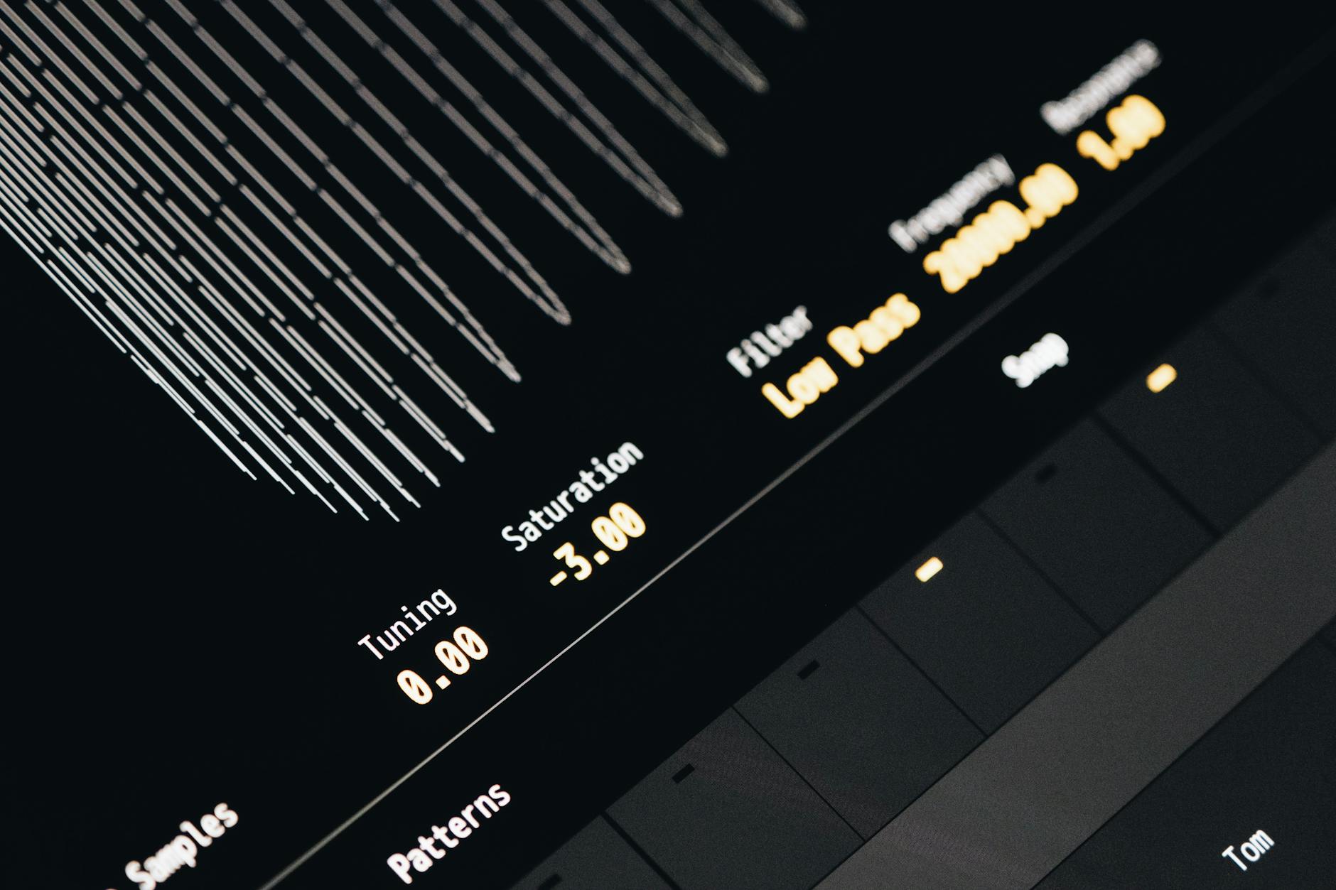 Close-up of a modern digital sound interface screen displaying tuning, saturation, and filter settings.