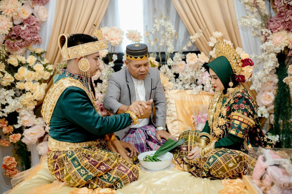 Cultural wedding ceremony in South East Sulawesi with traditional attire and rituals.
