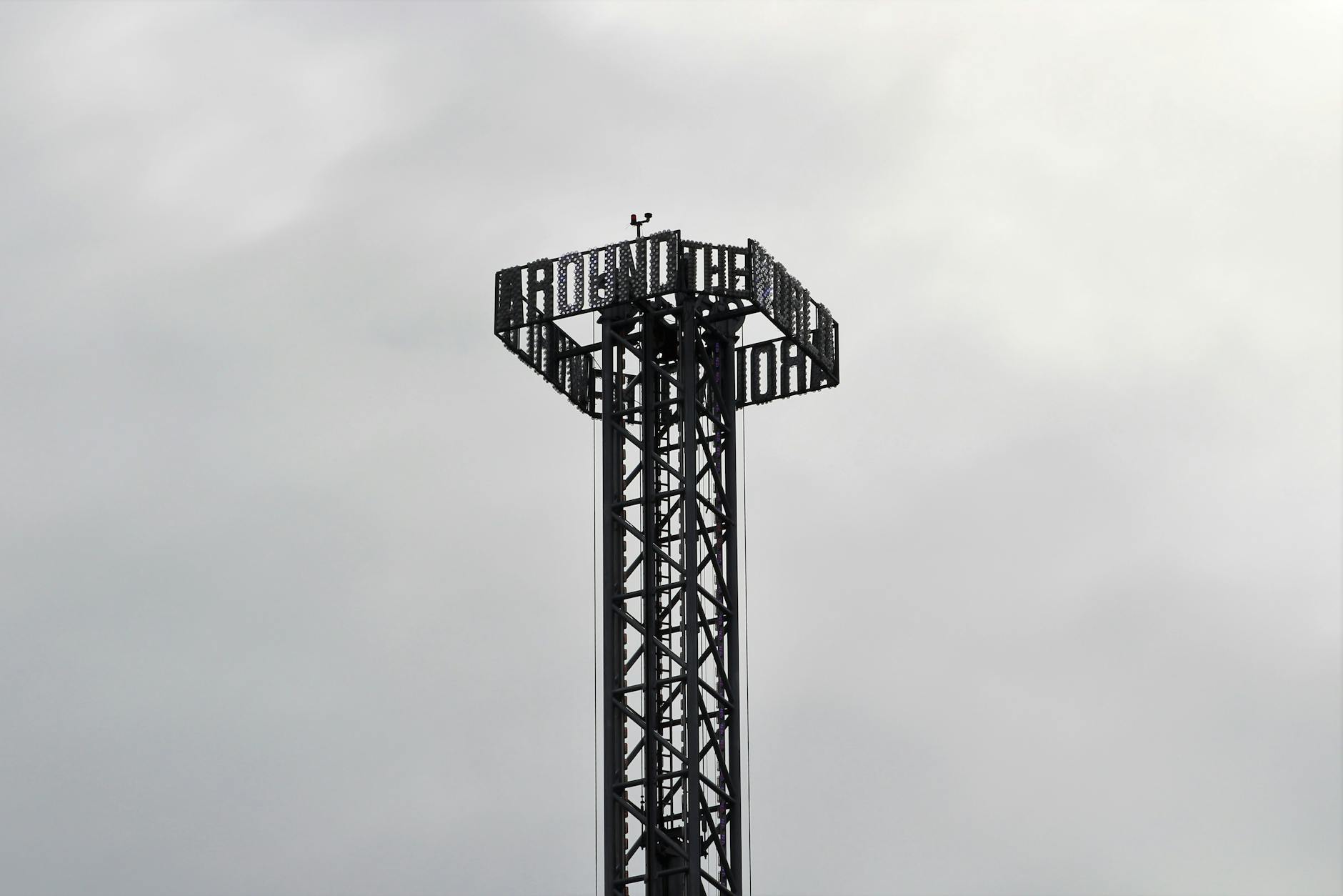 A metal structure standing tall against a cloudy sky in the Netherlands, emphasizing modern infrastructure.